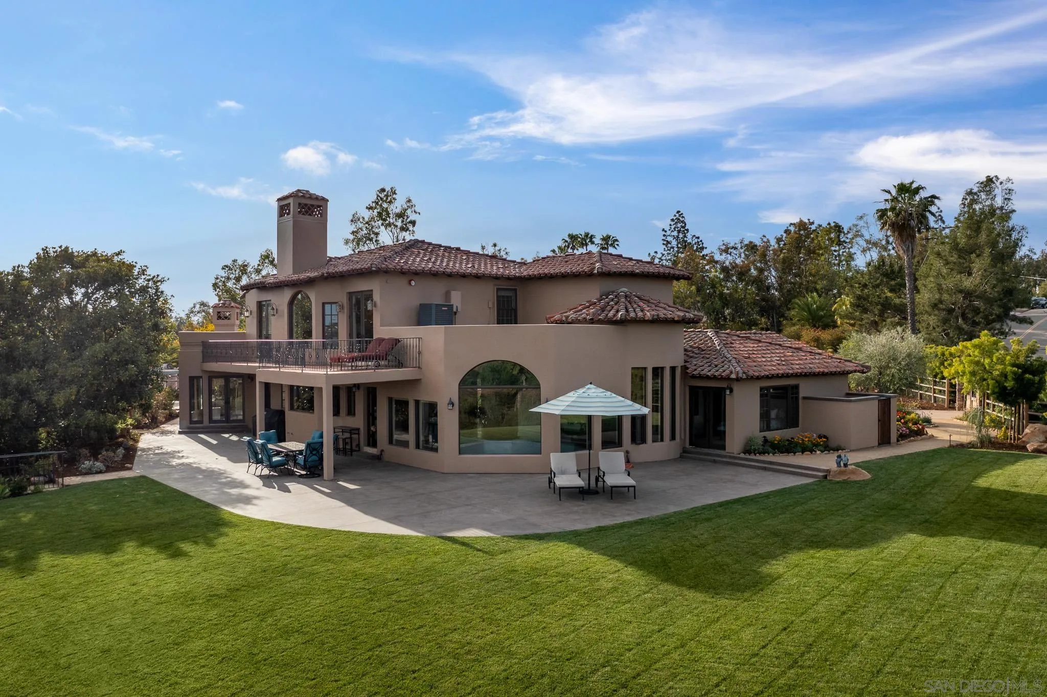 16738 Zumaque Street Rancho Santa Fe, CA 92067 - Photo 46 of 61 a view of a house with a yard porch and sitting area