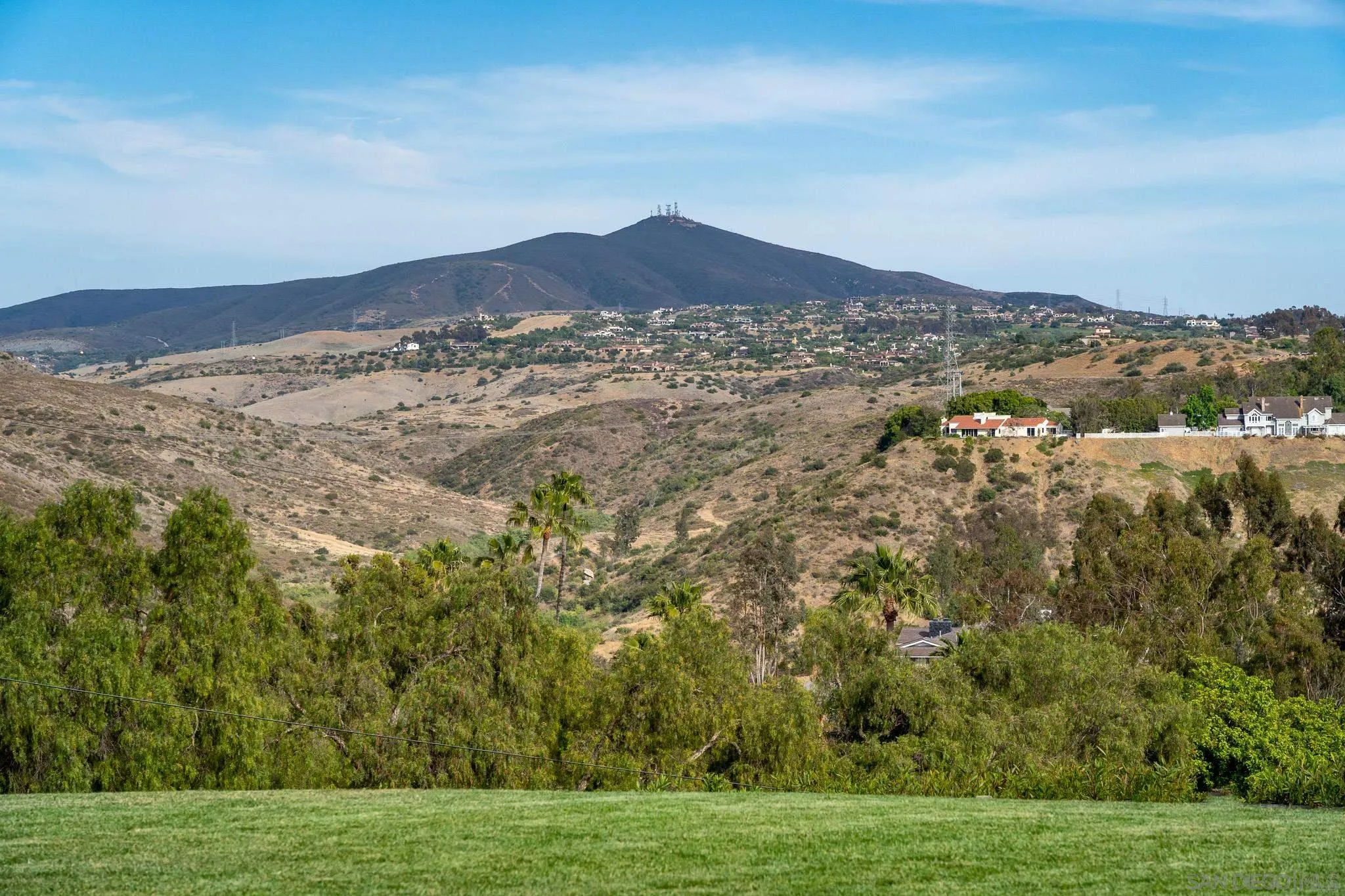 16738 Zumaque Street Rancho Santa Fe, CA 92067 - Photo 50 of 61 a view of a town with mountains in the background