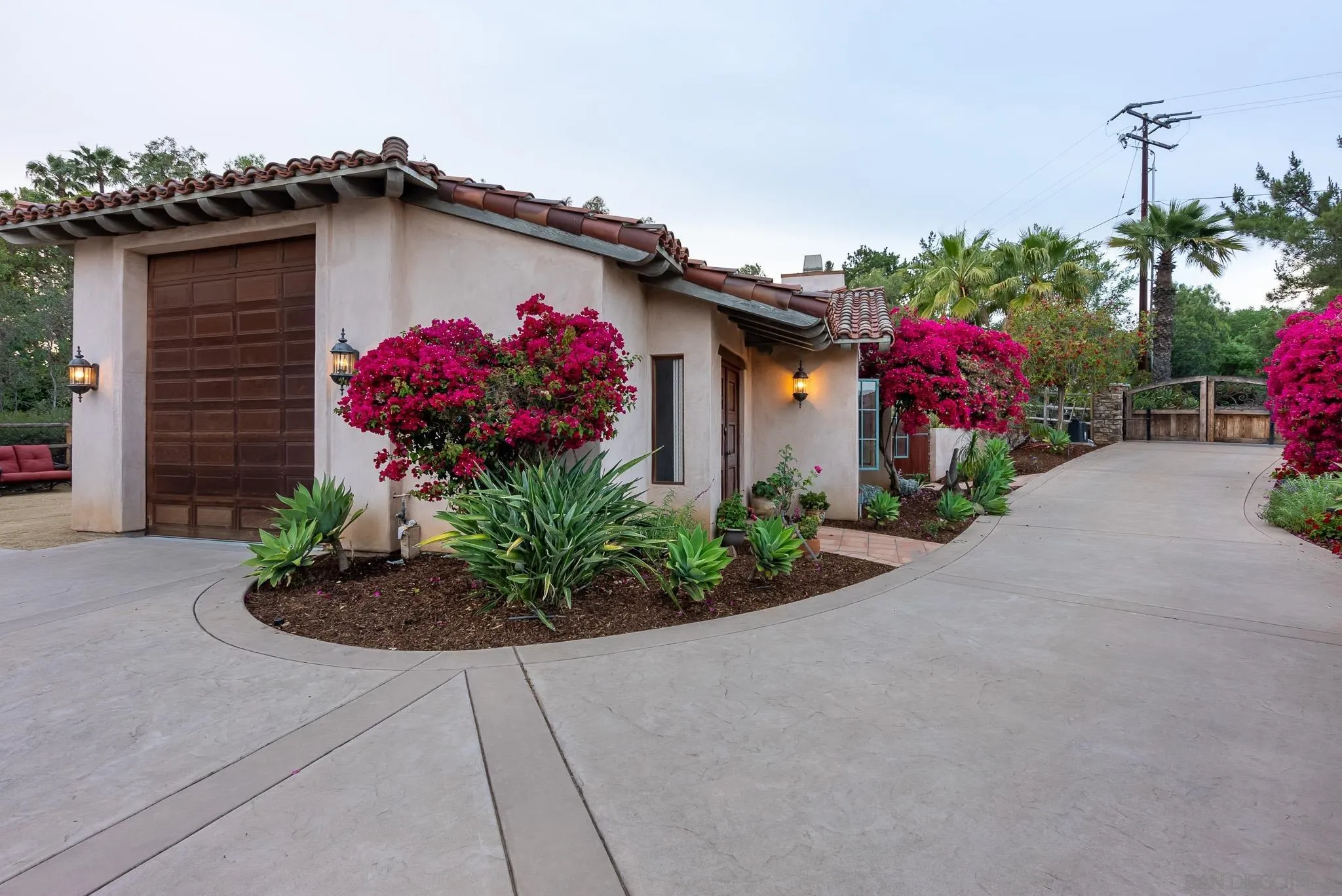 16738 Zumaque Street Rancho Santa Fe, CA 92067 - Photo 53 of 61 a front view of a house with a yard and a porch