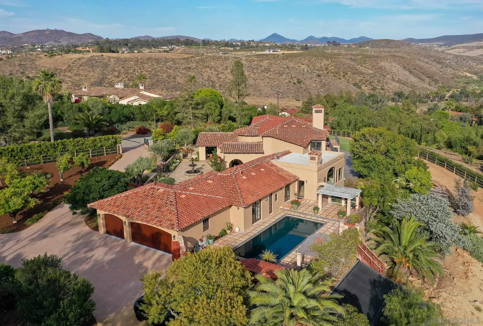 16738 Zumaque Street Rancho Santa Fe, CA 92067 - Photo 57 of 61 an aerial view of a house with a lake view