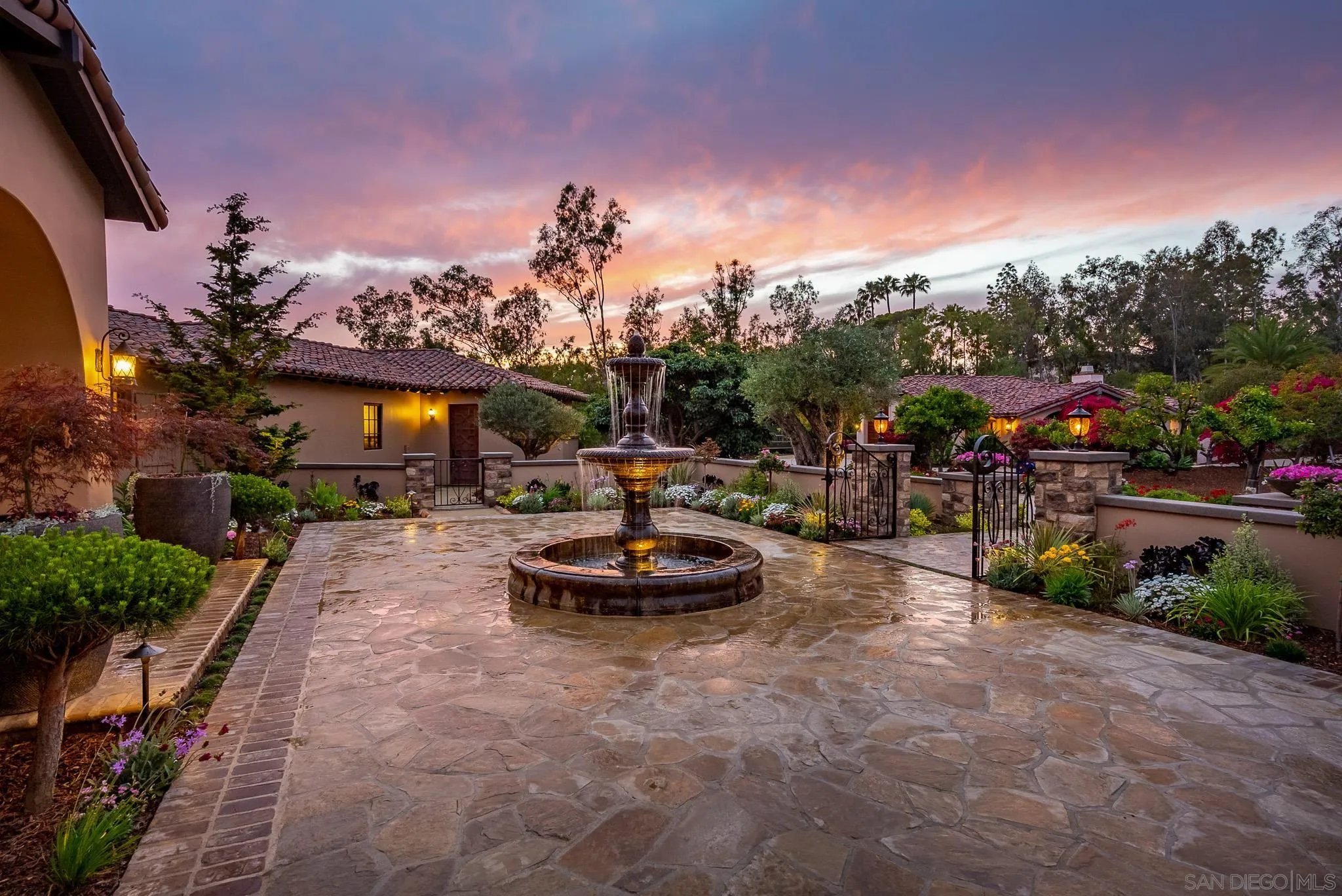 16738 Zumaque Street Rancho Santa Fe, CA 92067 - Photo 9 of 61 a view of a house with backyard and porch