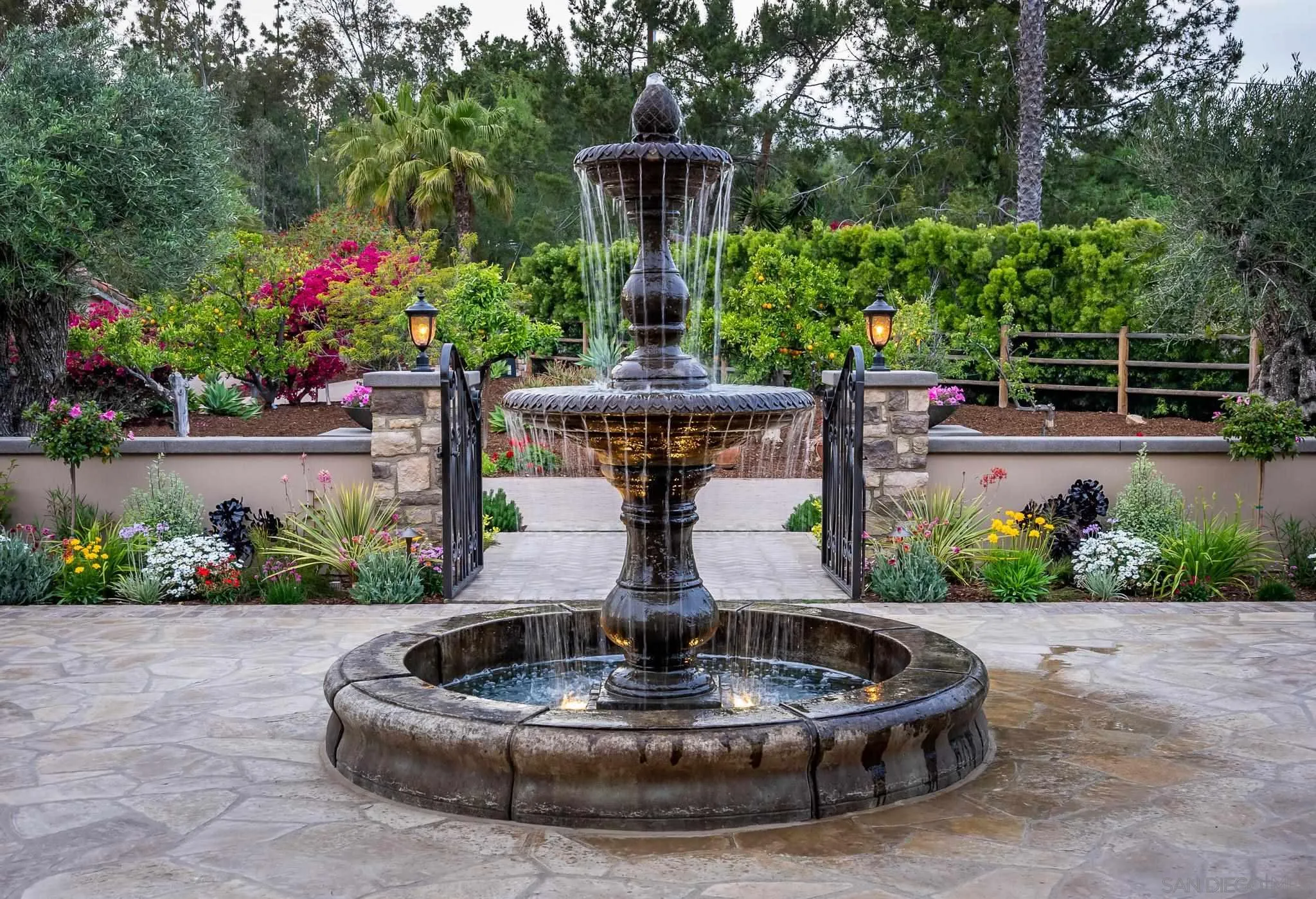16738 Zumaque Street Rancho Santa Fe, CA 92067 - Photo 10 of 61 a view of a water fountain in the back yard of a house