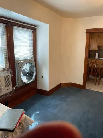 a room with furniture and a window