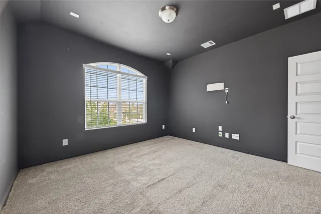 a view of a yard in front of a house with a yard