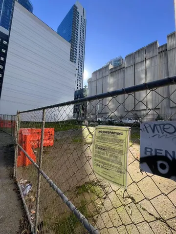 a view of a street with an outdoor space