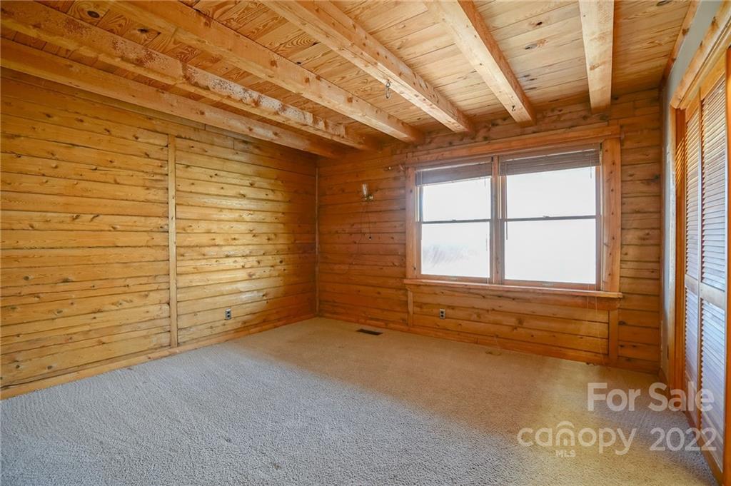 100 Rutledge Road Mount Holly, NC 28120 - Photo 12 of 44 a view of an empty room with a window