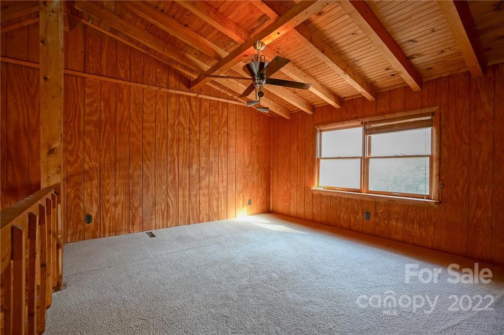 100 Rutledge Road Mount Holly, NC 28120 - Photo 23 of 44 a view of an empty room with a window