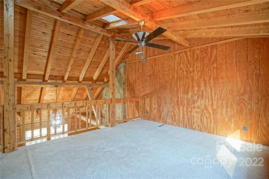 100 Rutledge Road Mount Holly, NC 28120 - Photo 24 of 44 a view of a room with wooden walls