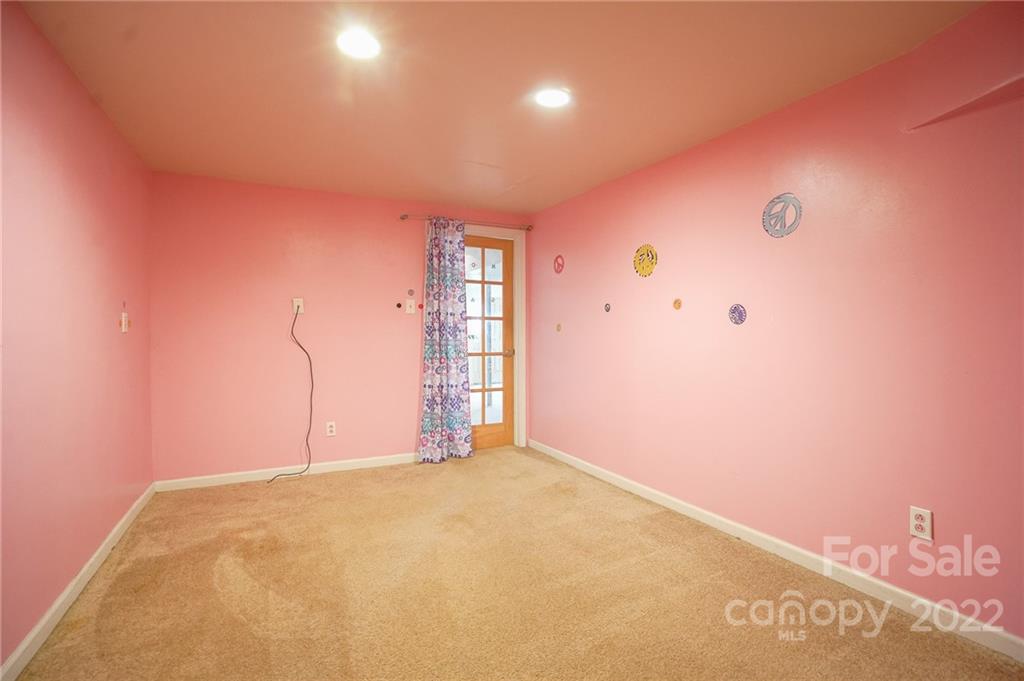 100 Rutledge Road Mount Holly, NC 28120 - Photo 36 of 44 a view of a big room with an empty space
