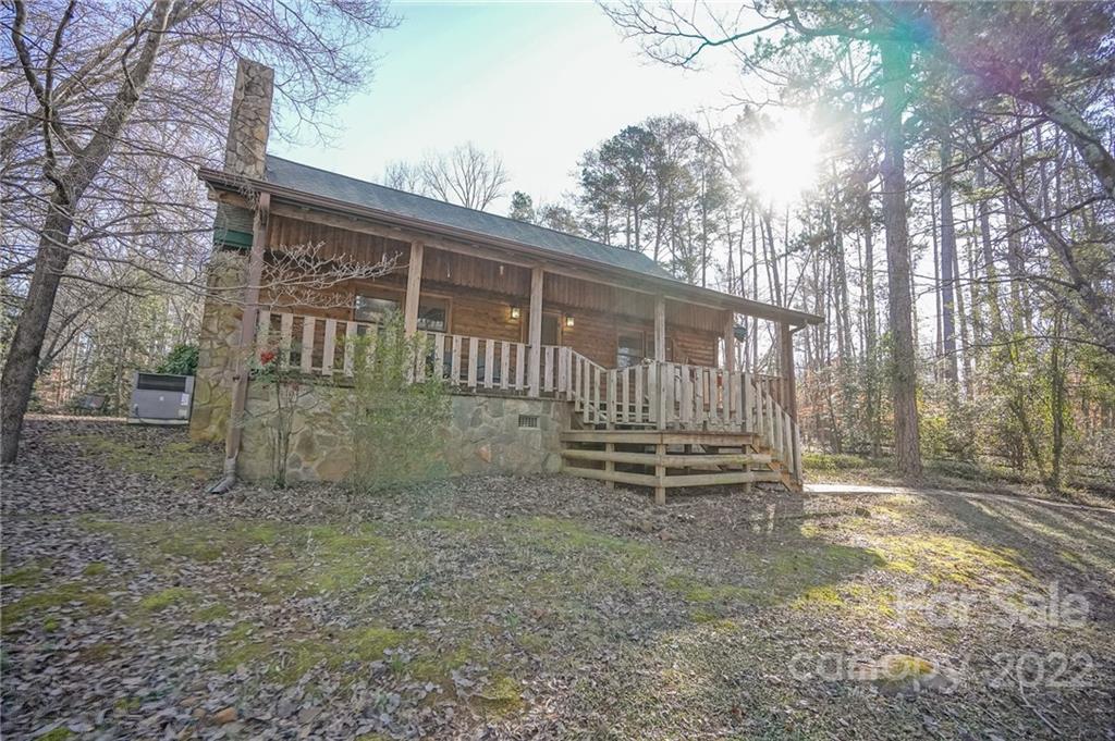 100 Rutledge Road Mount Holly, NC 28120 - Photo 4 of 44 a view of a bench in the backyard