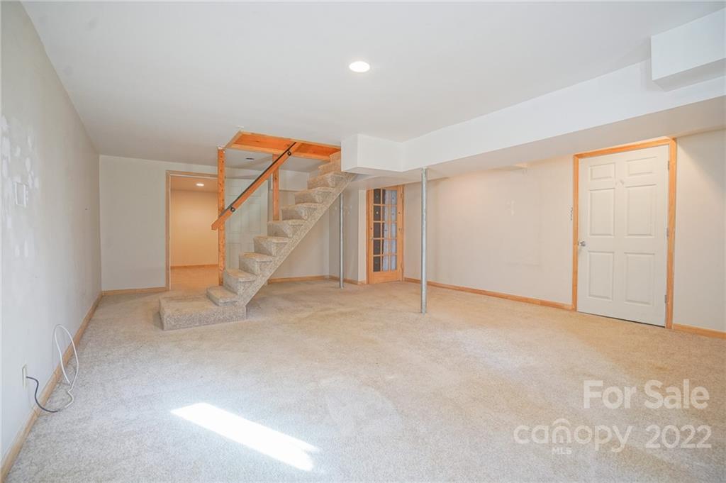 100 Rutledge Road Mount Holly, NC 28120 - Photo 43 of 44 a view of an empty room with wooden floor