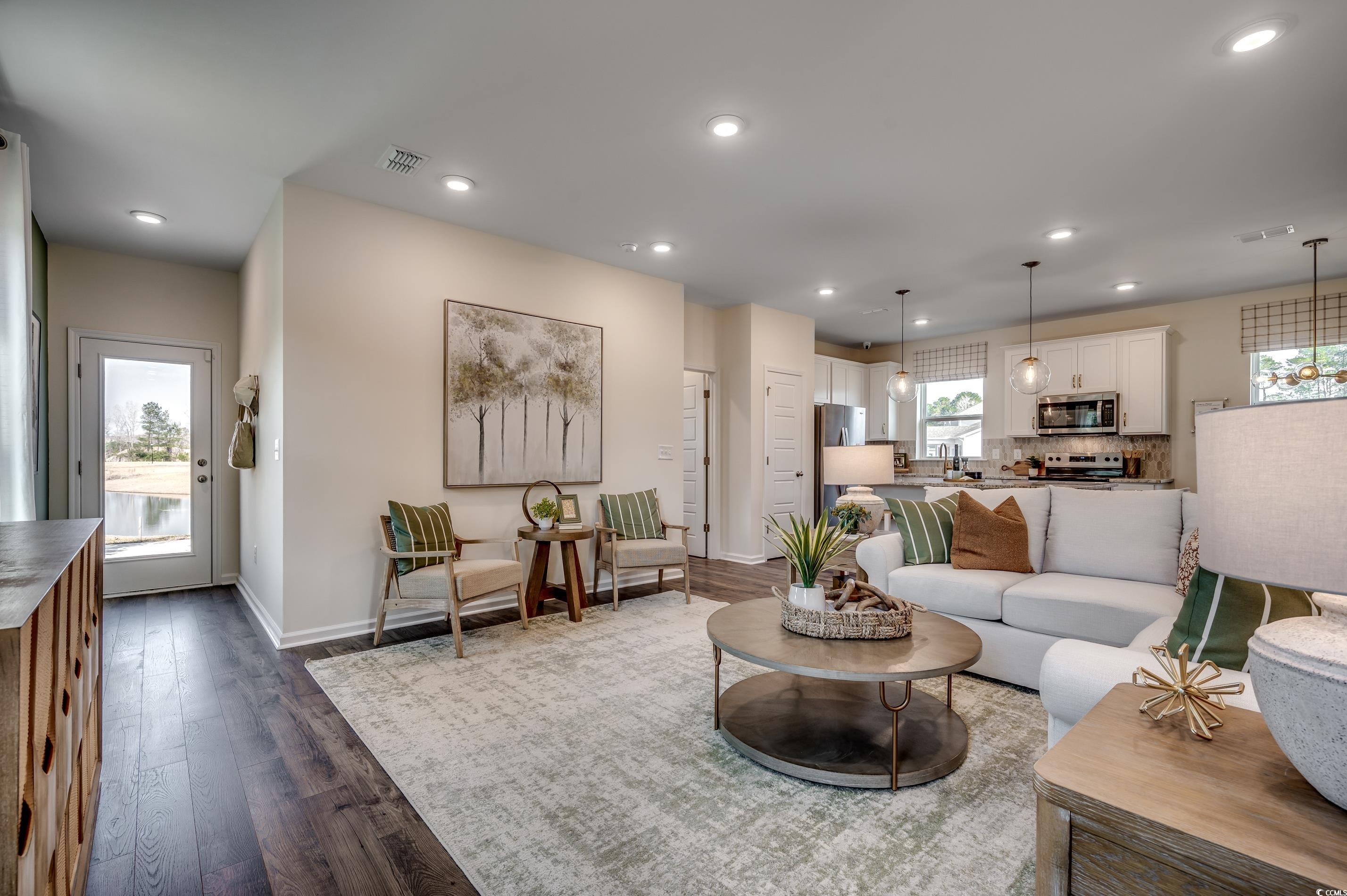 5009 Gallop Court Myrtle Beach, SC 29588 - Photo 7 of 14 Living room featuring recessed lighting and dark wood-style flooring