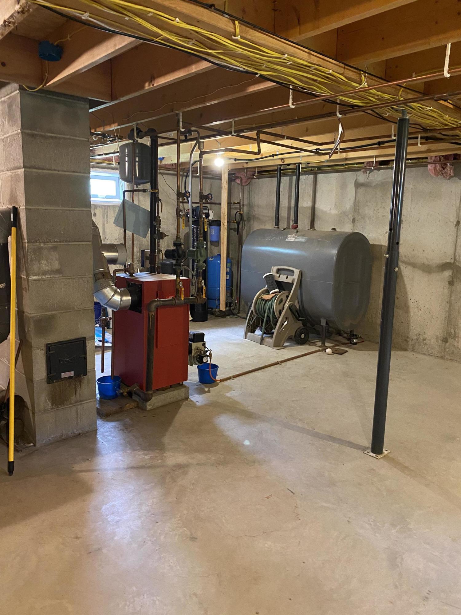 871 Plains Road Litchfield, ME 04350 - Photo 41 of 44 basement furnace and utiltities