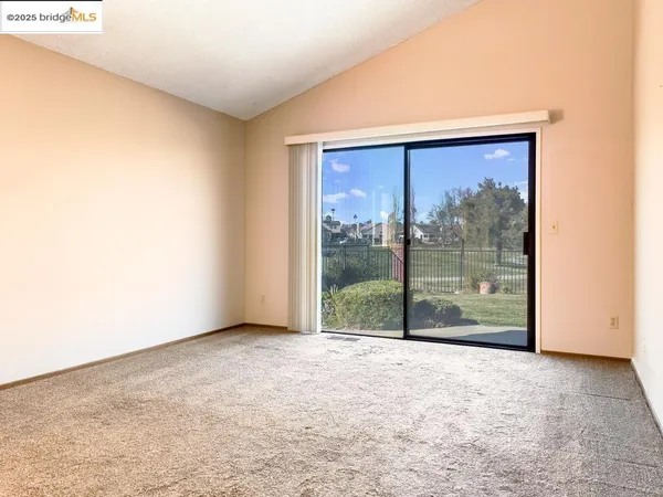 a spacious bathroom with a double vanity sink and a mirror