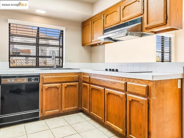 a view of a kitchen with storage and utility