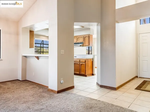 a view of a room that has a window in it