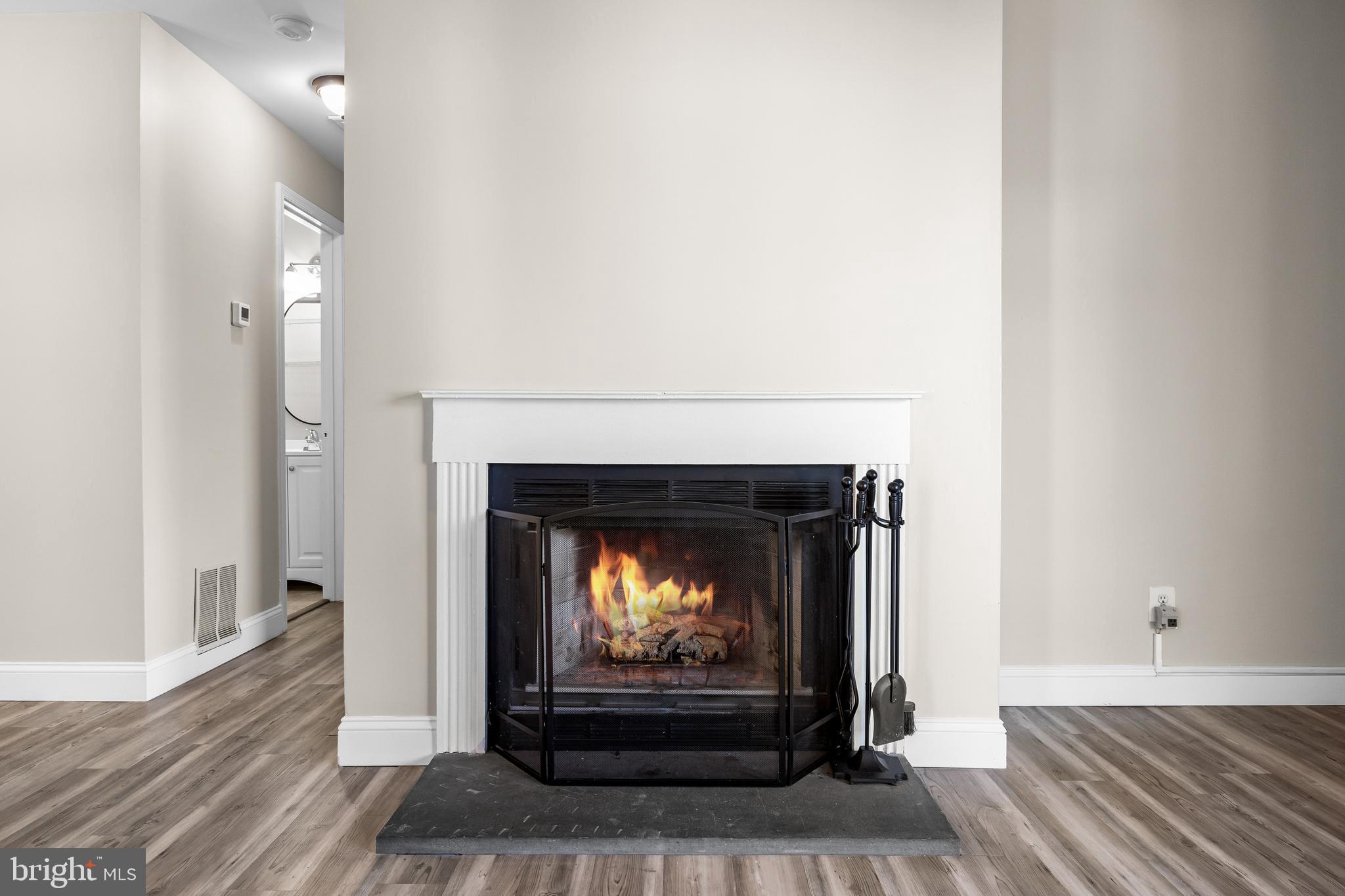 620 Covington Court Sewell, NJ 08080 - Photo 12 of 26 a living room with furniture and a fireplace