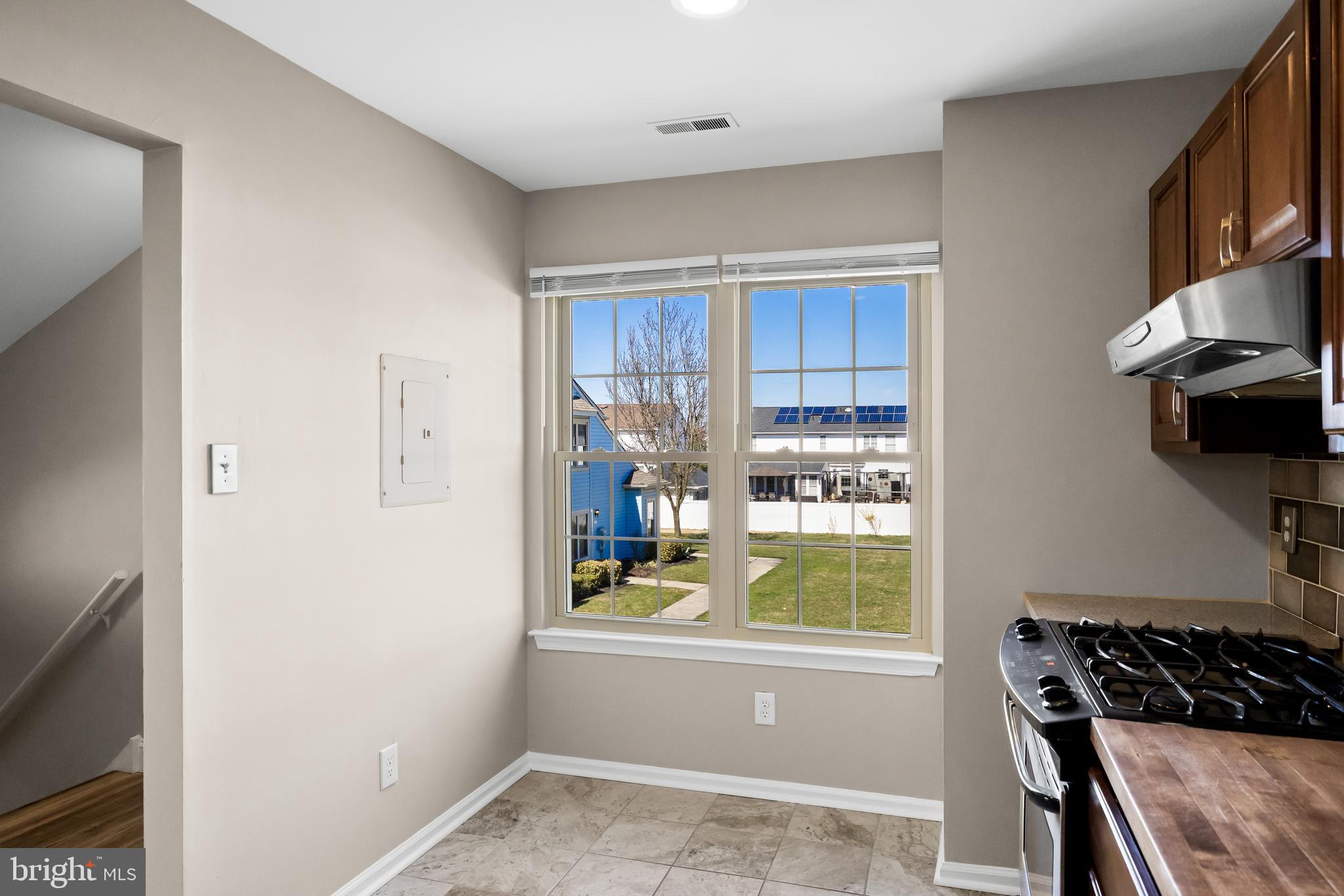 620 Covington Court Sewell, NJ 08080 - Photo 16 of 26 a kitchen with a refrigerator and a stove