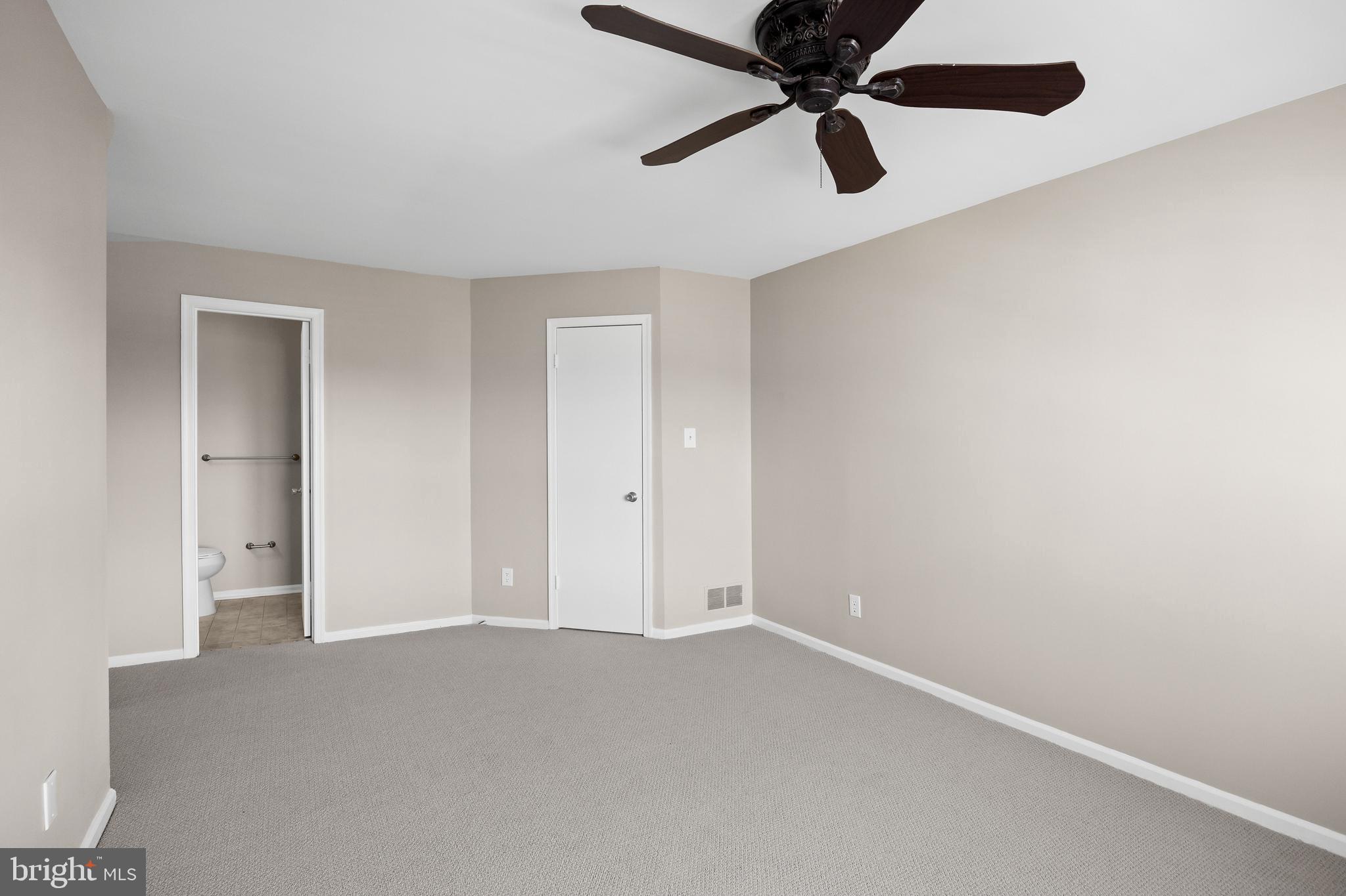 620 Covington Court Sewell, NJ 08080 - Photo 19 of 26 an empty room with chandelier fan