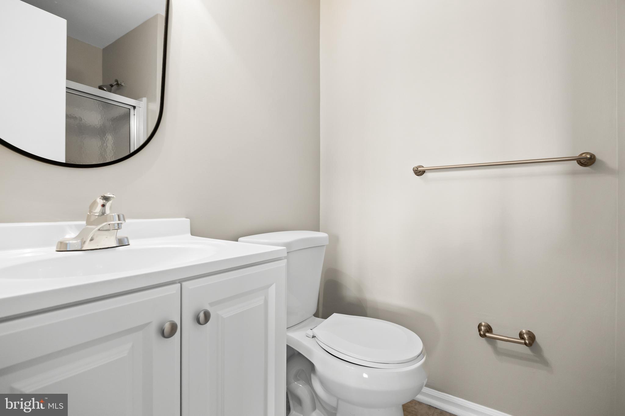 620 Covington Court Sewell, NJ 08080 - Photo 20 of 26 a bathroom with a sink toilet and mirror