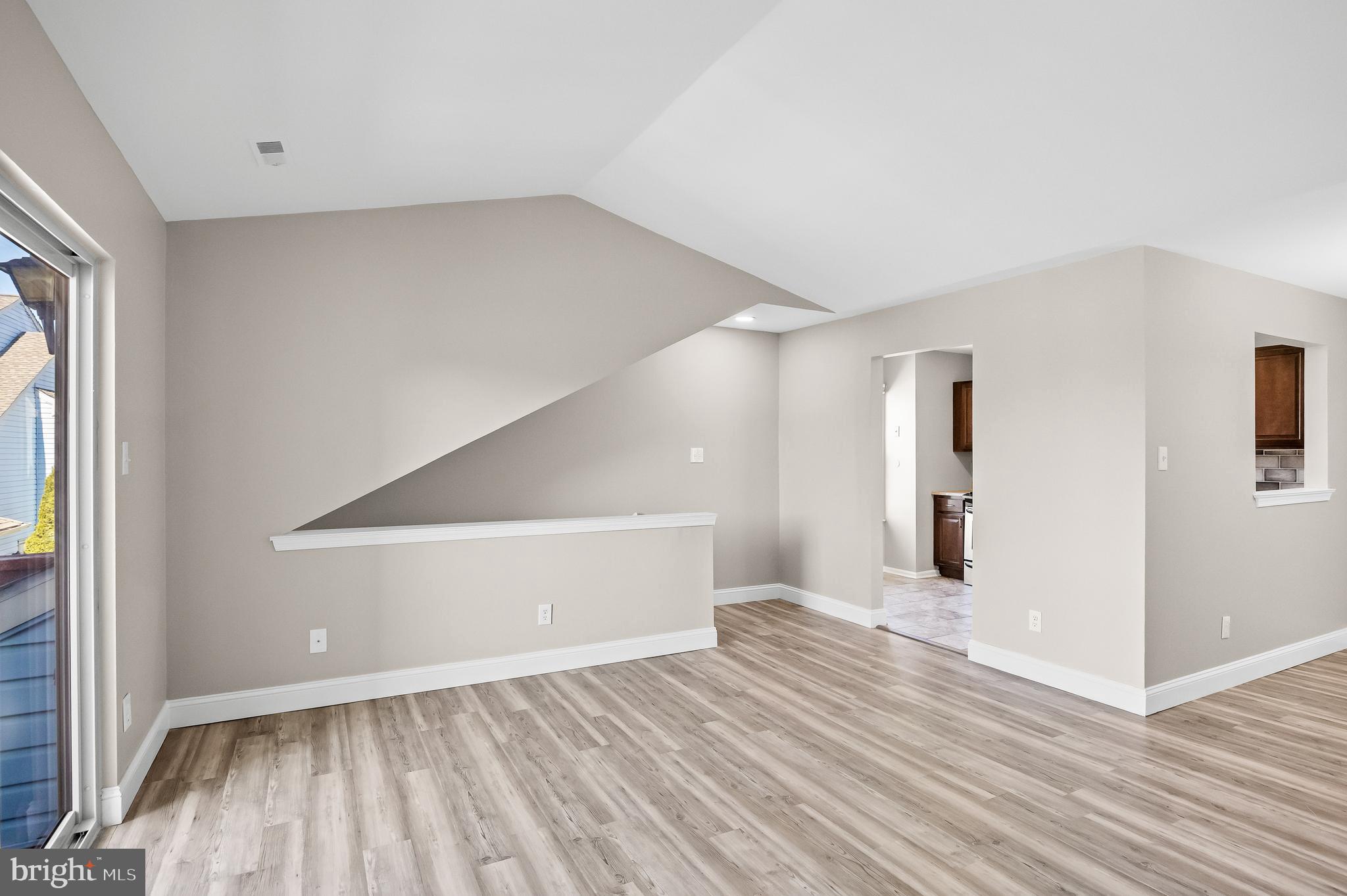 620 Covington Court Sewell, NJ 08080 - Photo 10 of 26 a view of an empty room with wooden floor