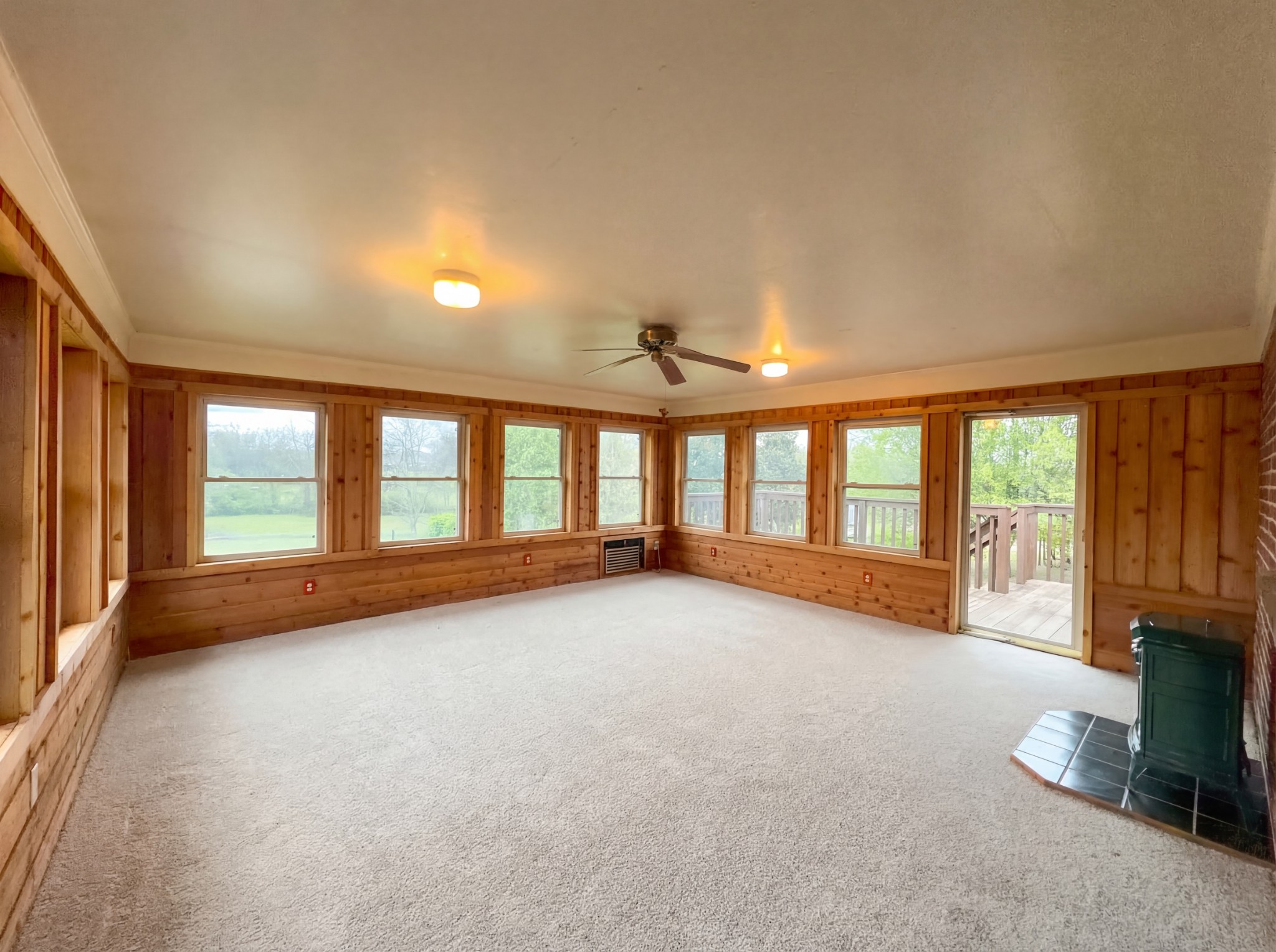 823 Apple Valley Road Madison, TN 37115 - Photo 15 of 23 an empty room with windows and ceiling fan