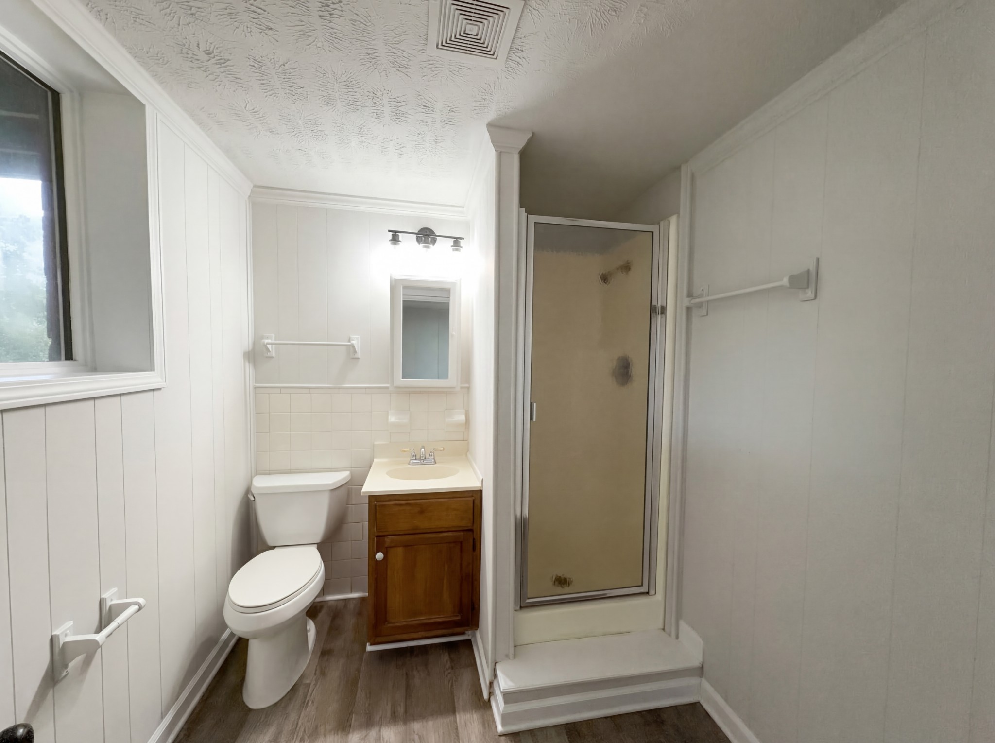 823 Apple Valley Road Madison, TN 37115 - Photo 19 of 23 a bathroom with a toilet a sink and shower