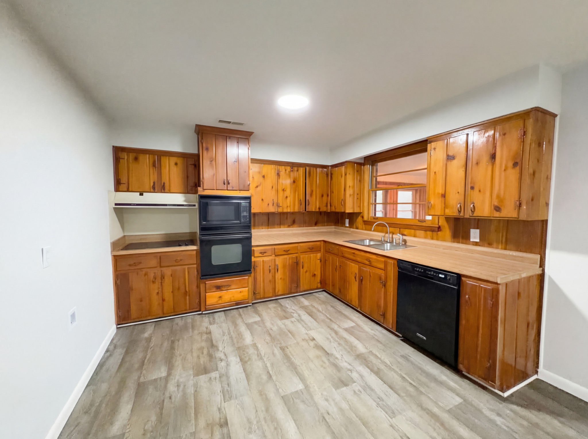 823 Apple Valley Road Madison, TN 37115 - Photo 2 of 23 a kitchen with stainless steel appliances granite countertop a stove and a sink