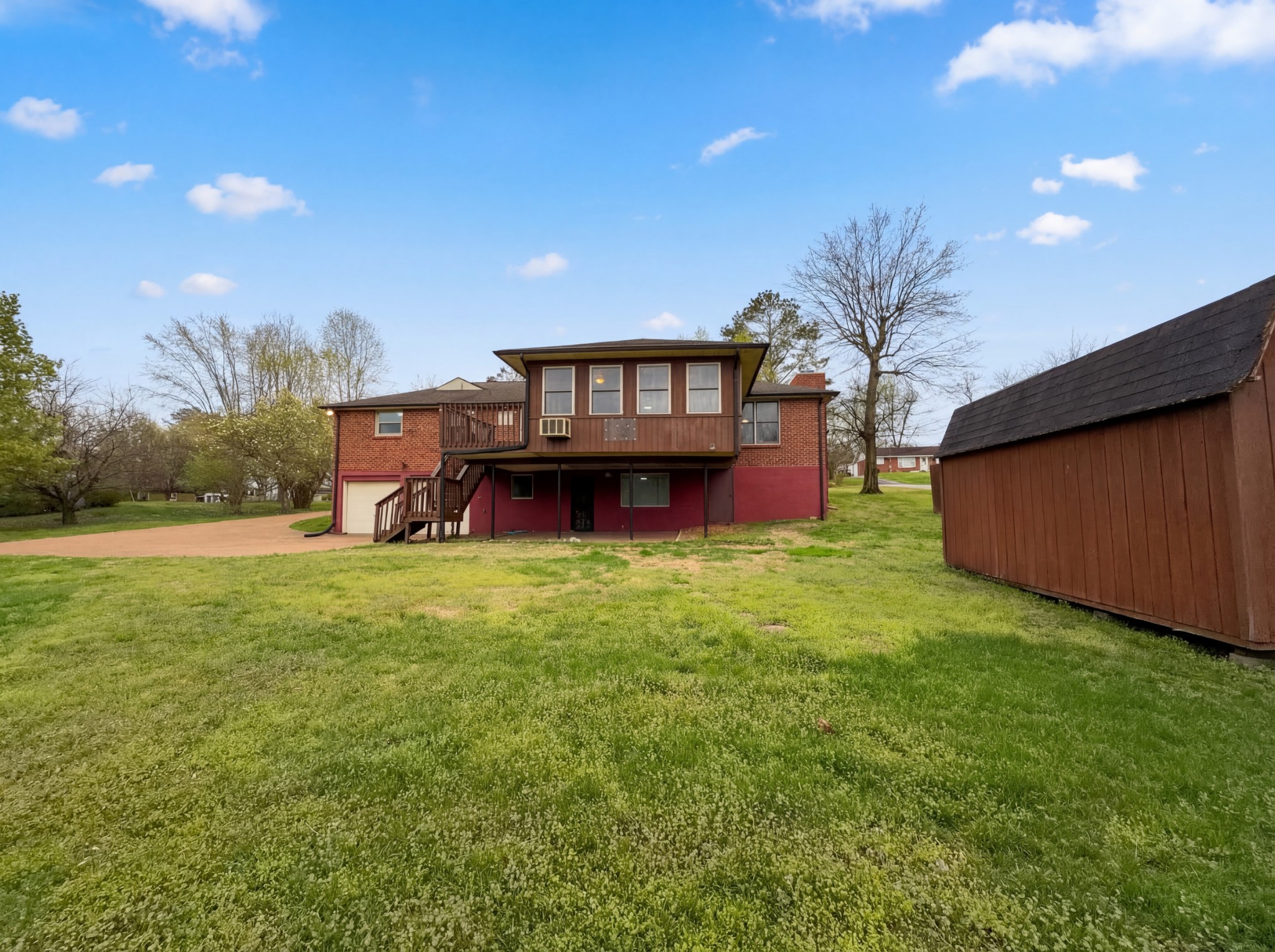 823 Apple Valley Road Madison, TN 37115 - Photo 22 of 23 a view of a big yard with potted plants