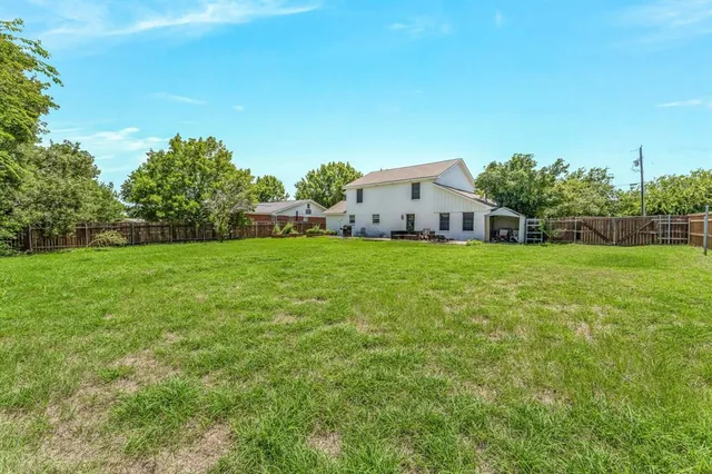 a house view with a garden space
