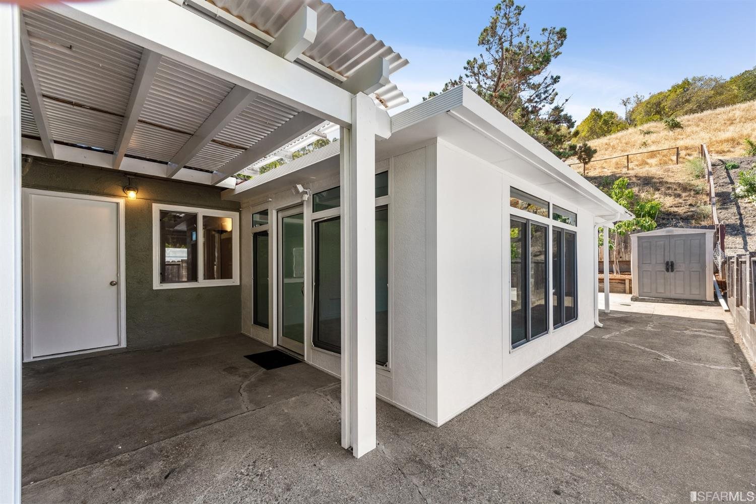 1166 Rising Glen Road Pinole, CA 94564 - Photo 25 of 31 a view of a house with porch