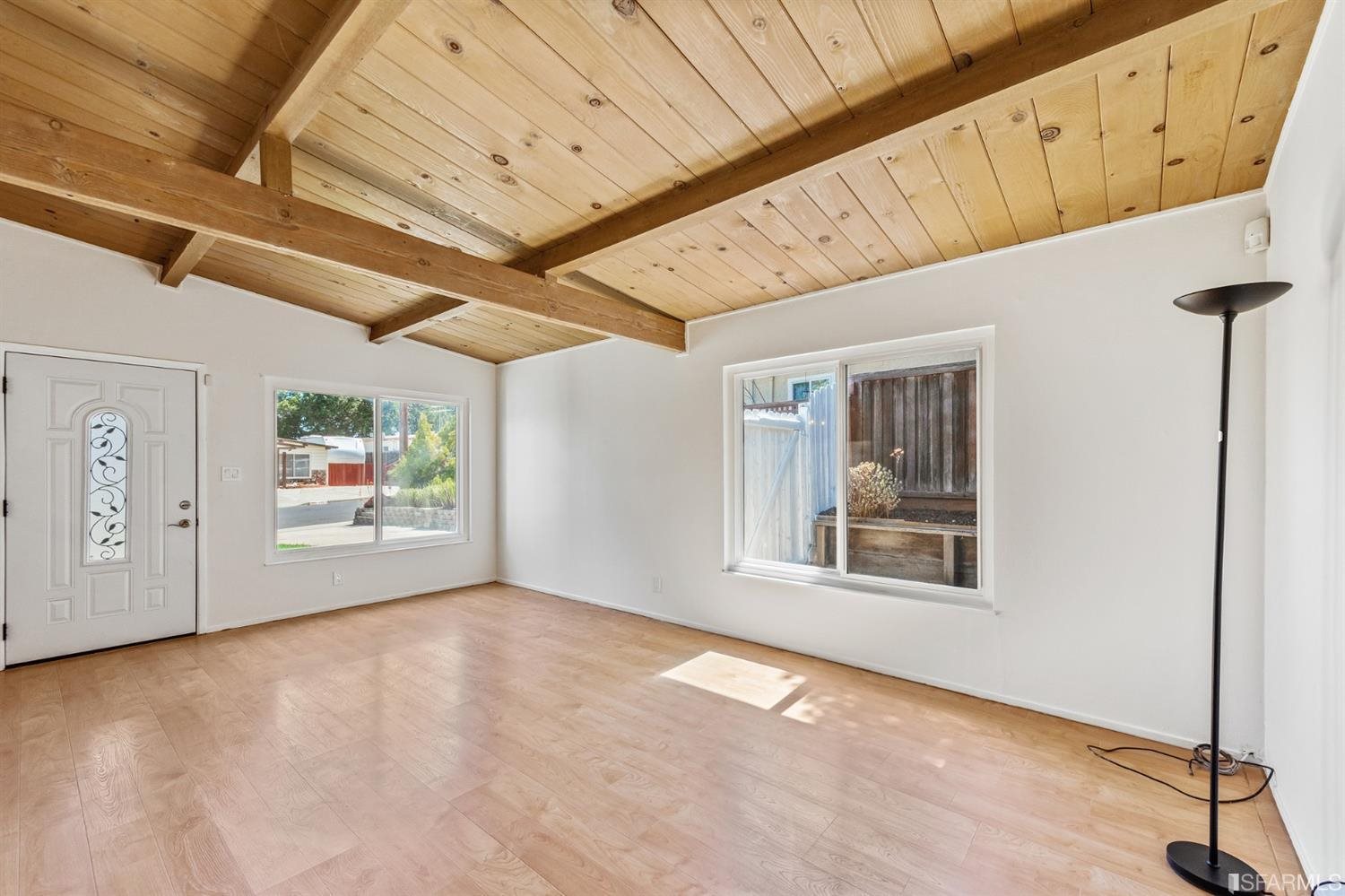 1166 Rising Glen Road Pinole, CA 94564 - Photo 4 of 31 a view of an empty room with a window