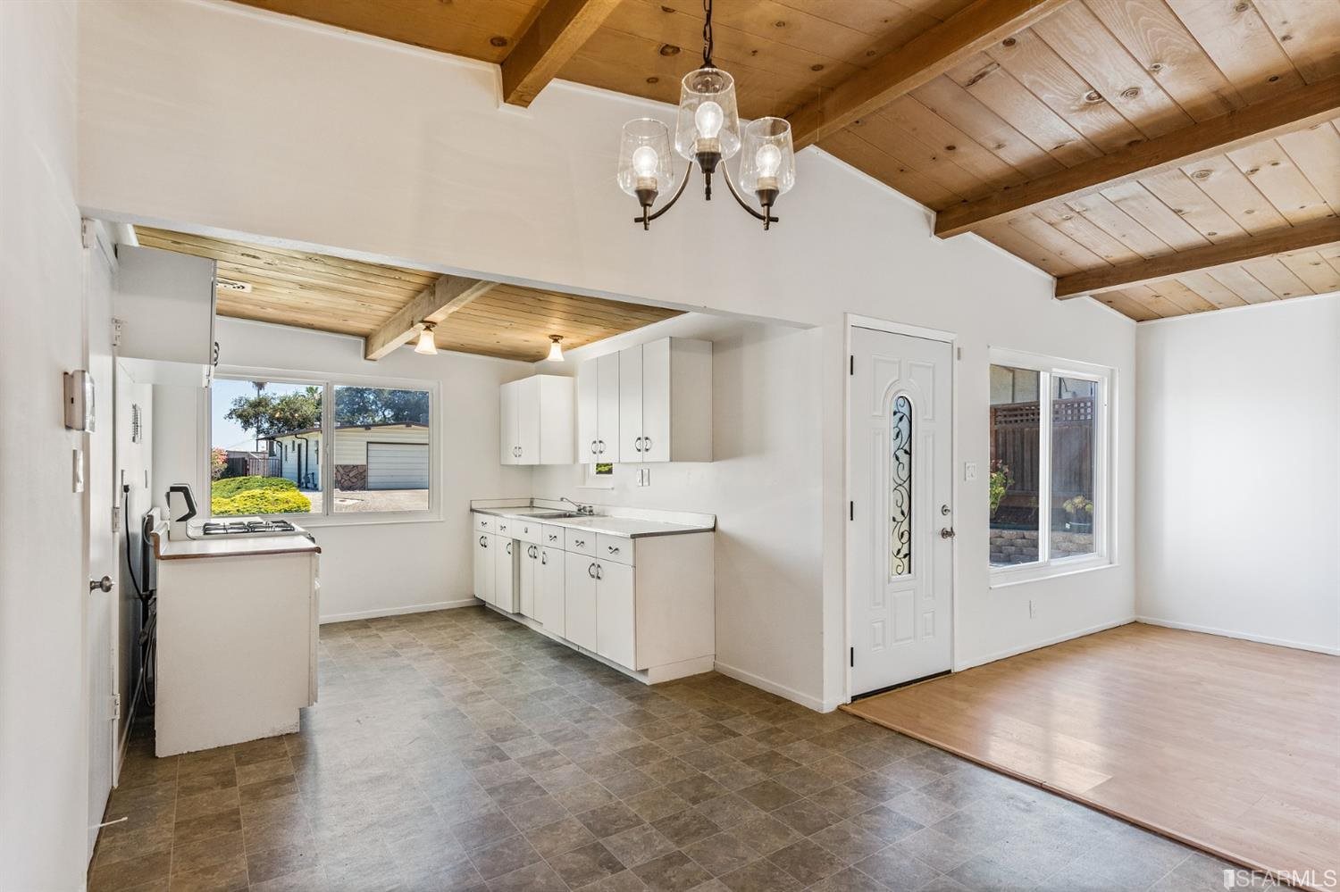1166 Rising Glen Road Pinole, CA 94564 - Photo 8 of 31 a kitchen with sink cabinets and window