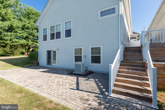 a view of a house with wooden floor and fence