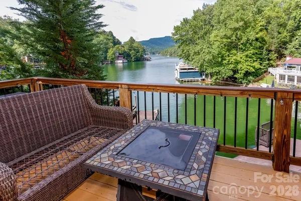a view of a two chairs in the roof deck