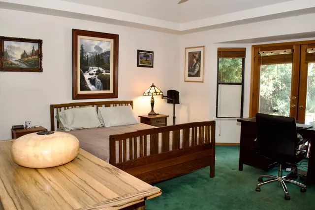 a balcony with furniture and a window