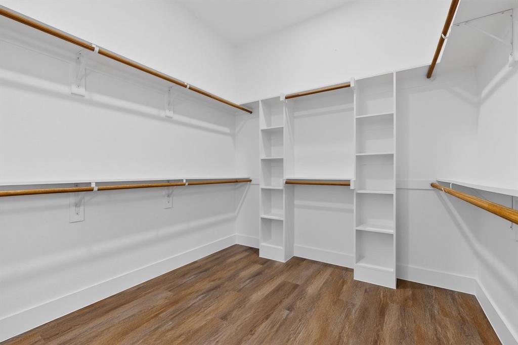 4737 Pine Ridge Court Athens, TX 75752 - Photo 13 of 26 a room with walk in closet and wooden floor