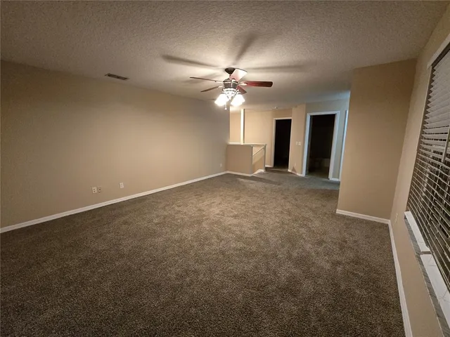 a view of a hallway with closet area