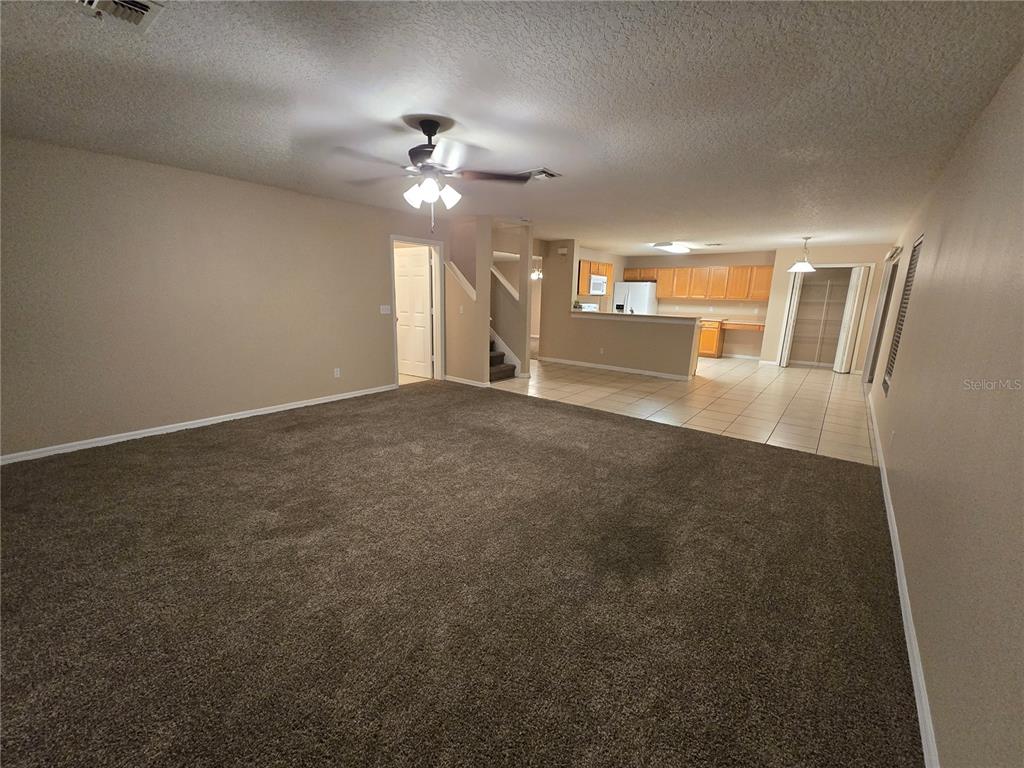 8 Windrose Drive Orlando, FL 32824 - Photo 20 of 23 an empty room with entrance and windows