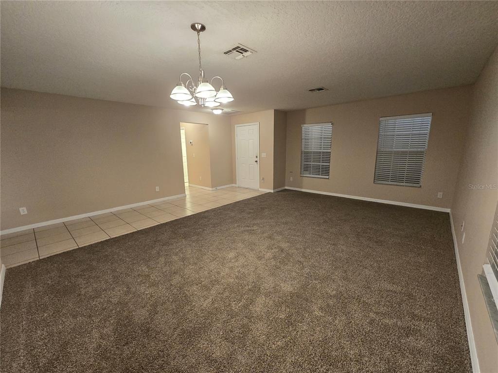 8 Windrose Drive Orlando, FL 32824 - Photo 23 of 23 a view of an empty room with a window
