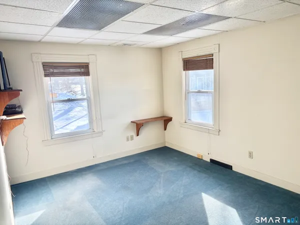 an empty room with windows