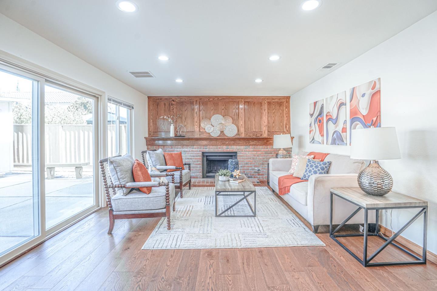 847 Pacheco Drive Milpitas, CA 95035 - Photo 26 of 68 a living room with furniture and a fireplace