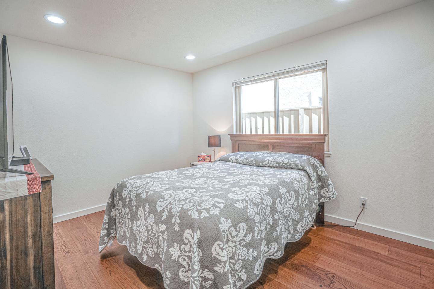 847 Pacheco Drive Milpitas, CA 95035 - Photo 32 of 68 a bedroom with a bed and a window