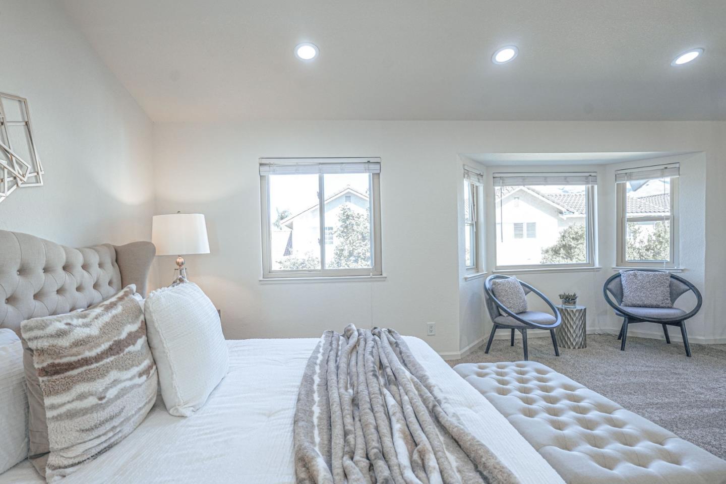 847 Pacheco Drive Milpitas, CA 95035 - Photo 48 of 68 a bedroom with a bed and wooden floor