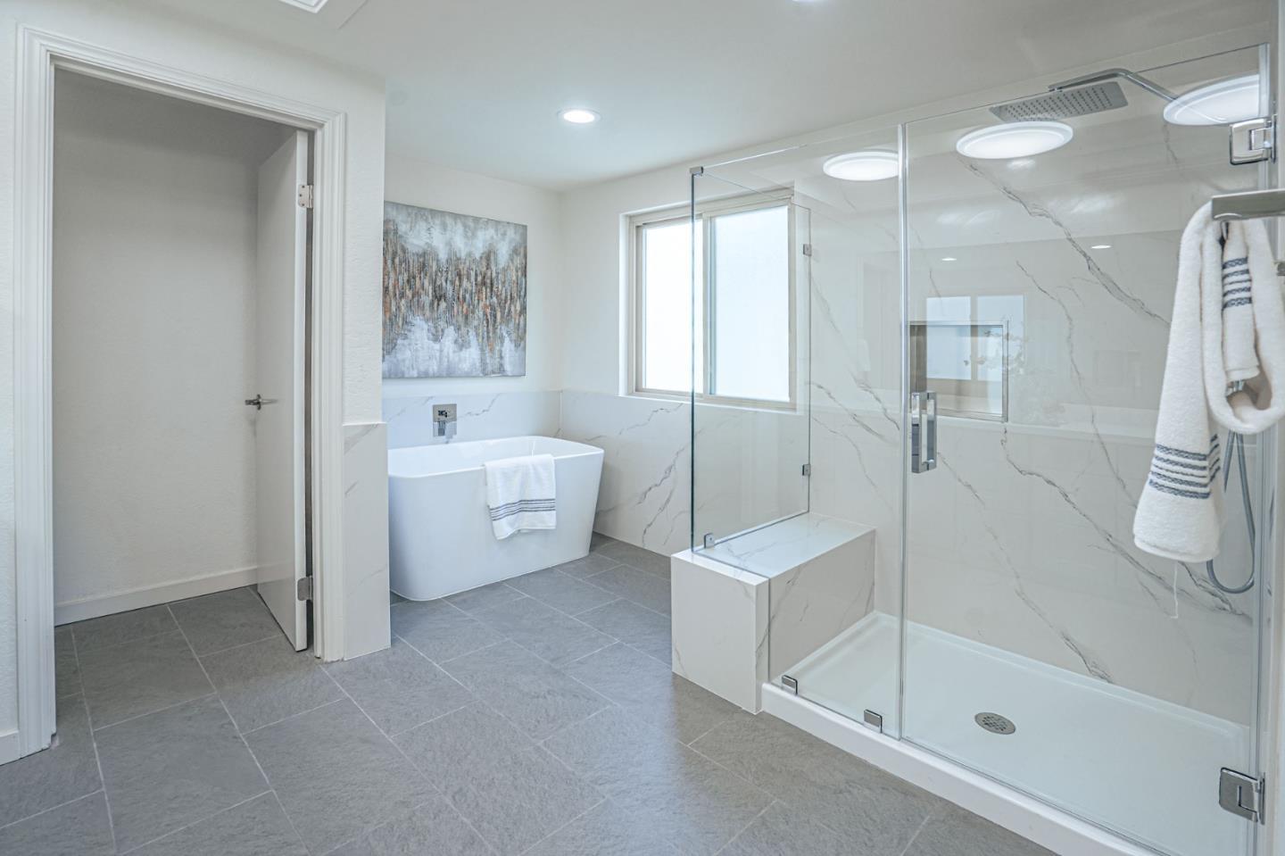 847 Pacheco Drive Milpitas, CA 95035 - Photo 53 of 68 a bathroom with a bathtub a toilet and a shower