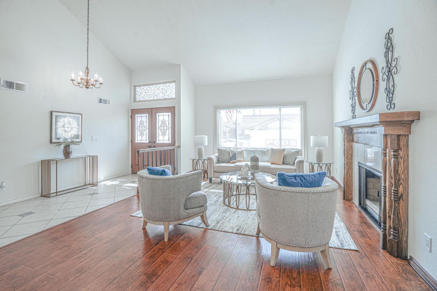 847 Pacheco Drive Milpitas, CA 95035 - Photo 9 of 68 a living room with fireplace furniture and a wooden floor