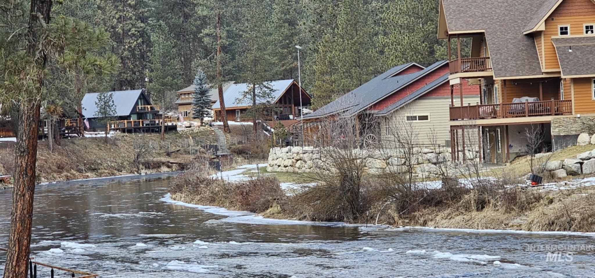 36 Kevins Way Garden Valley, ID 83622 - Photo 11 of 50 Yard covered in snow featuring a water view 2nd house