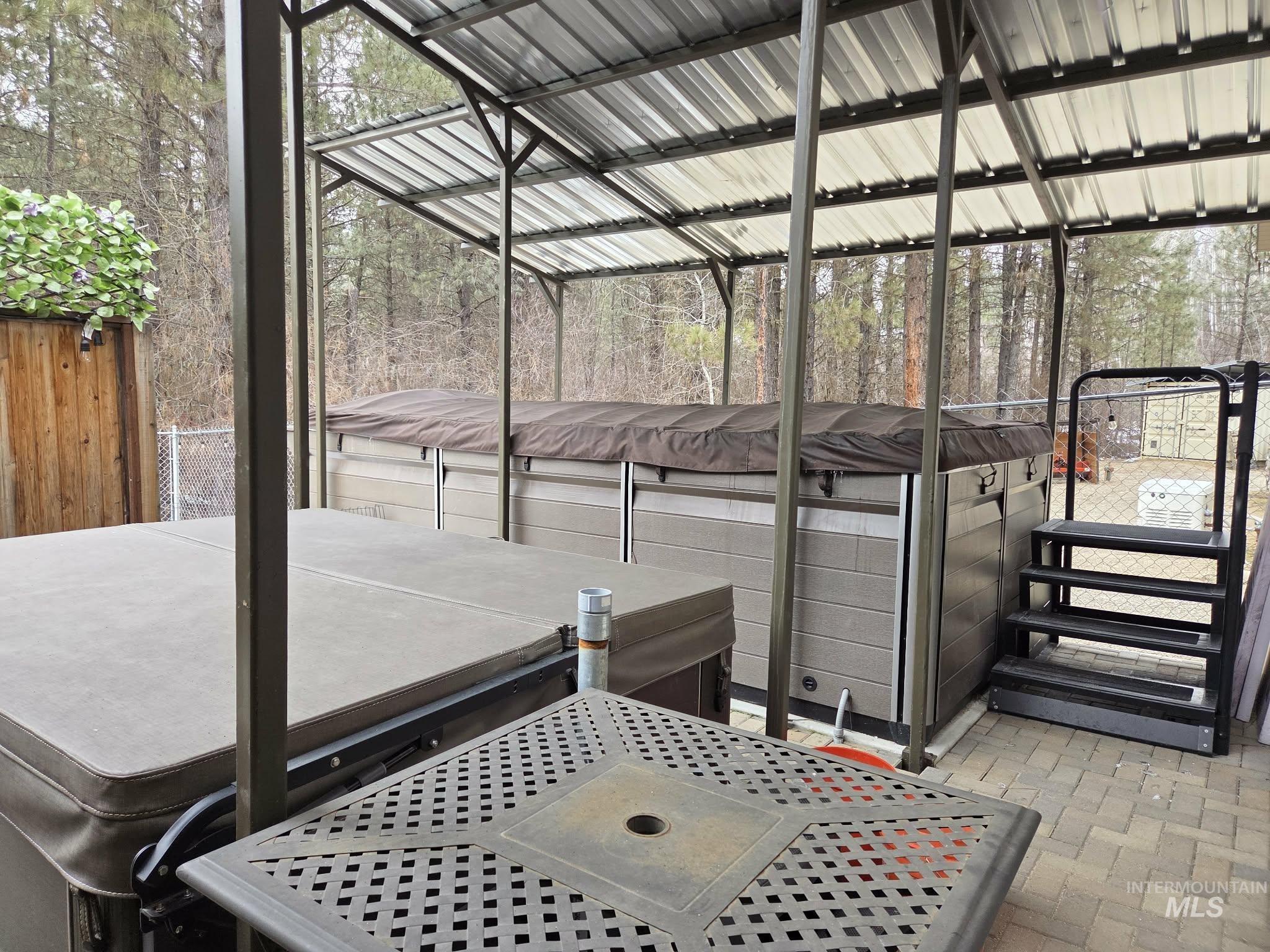 36 Kevins Way Garden Valley, ID 83622 - Photo 12 of 50 View of patio / terrace featuring a hot tub & Swimspa