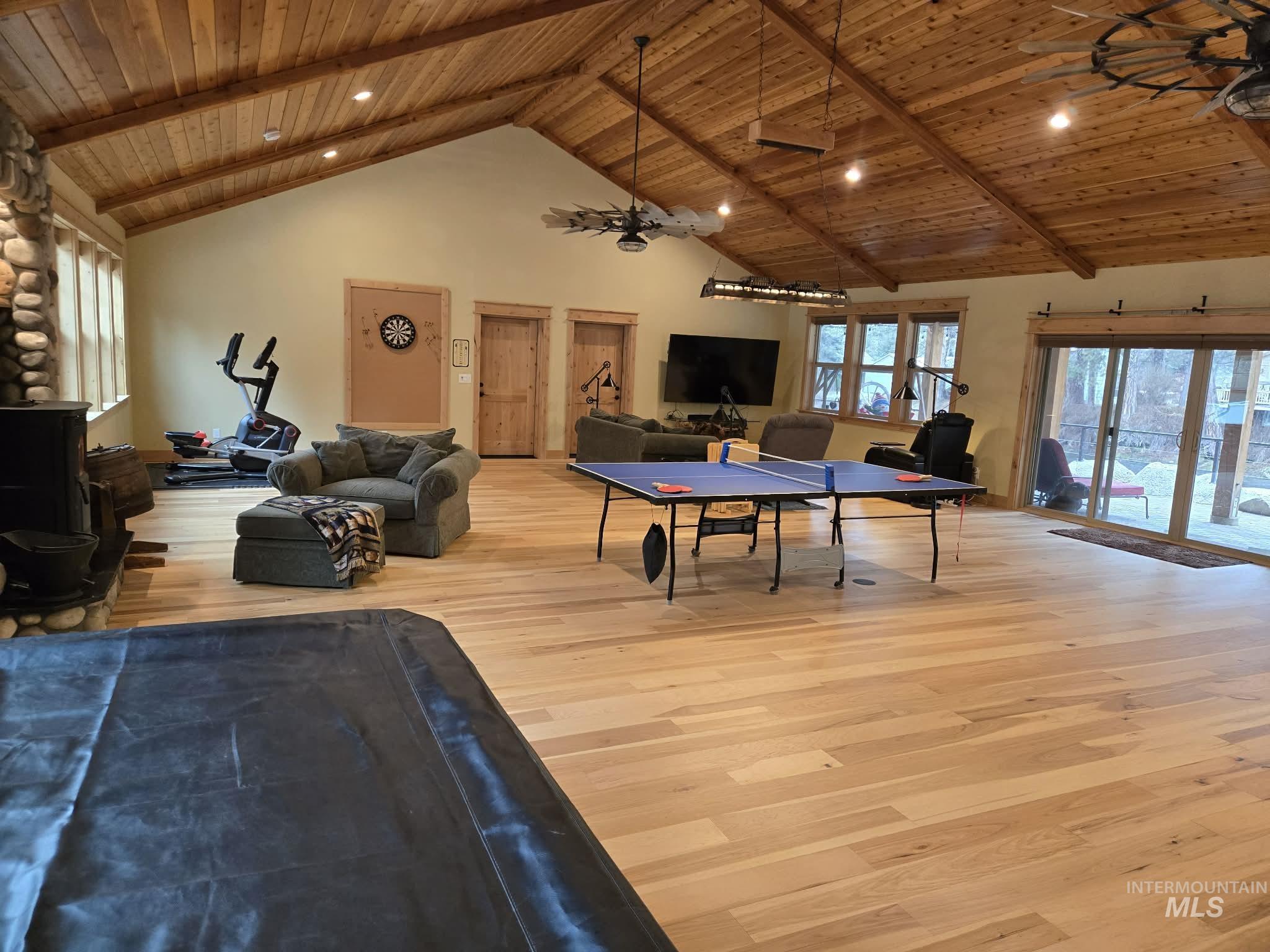 36 Kevins Way Garden Valley, ID 83622 - Photo 27 of 50 Game room featuring a ceiling fan, a high wooden beamed ceiling, light wood-type flooring, and recessed lighting
