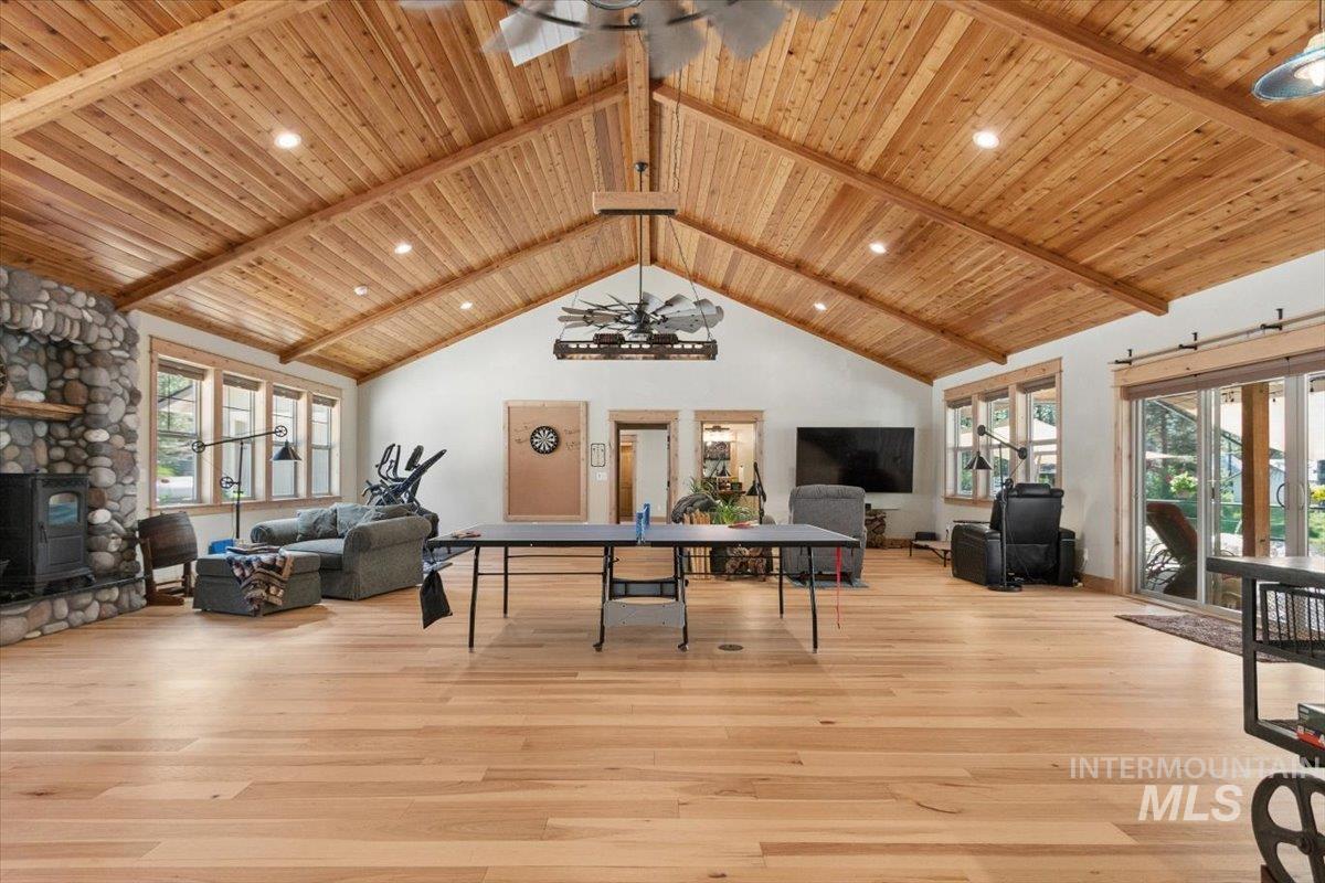 36 Kevins Way Garden Valley, ID 83622 - Photo 31 of 50 Game room featuring a ceiling fan, a high wooden beamed ceiling, light wood-type flooring, and recessed lighting